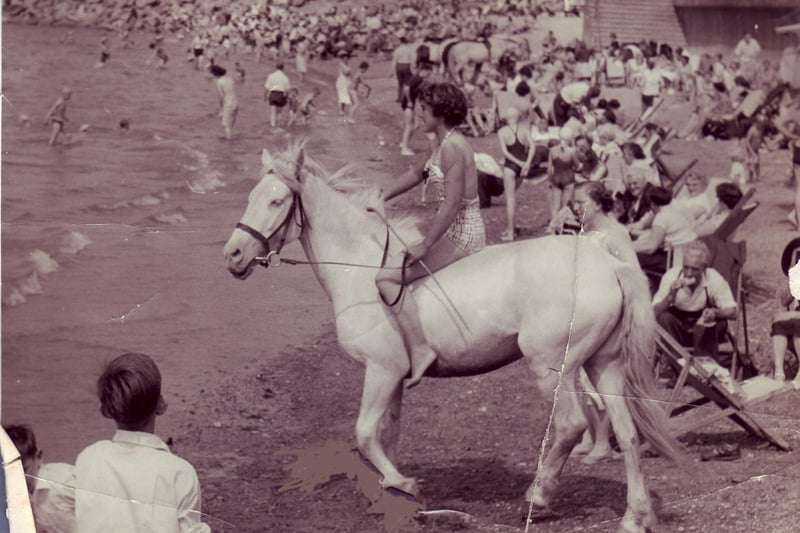 A busy Morecambe beach in mid summer. The picture shows Robert Lupton senior's second wife Barbara on a horse called Prince. She was 15-years-old at the time.