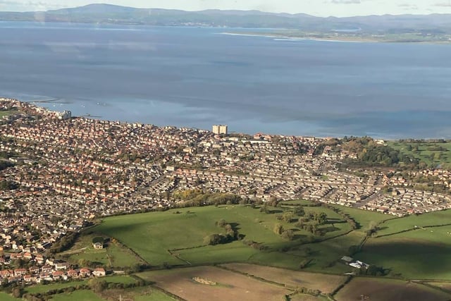 Looking across part of Morecambe and the bay to Cumbria beyond.