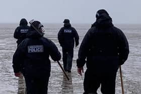 Police officers took part in an extensive search of the Morecambe Bay coast after human remains were found at the weekend.