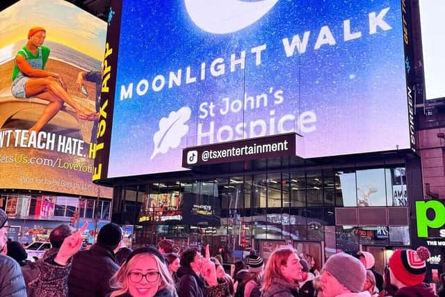 The Moonlight Walk advertised in Times Square, New York.