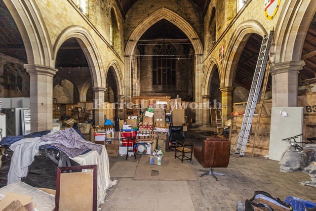 The interior space of the church in Morecambe which is currently used as storage.