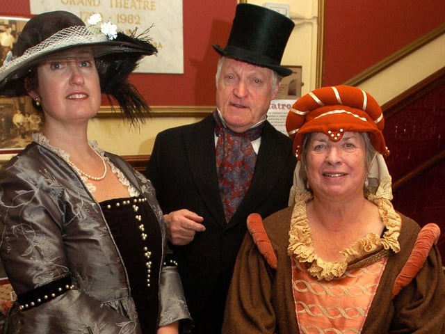 Displaying some of the costumes from Lancaster Footlights' wardrobe at a Grand Theatre open day are Sally Fisher, Alec Crouch and Jan Crouch.