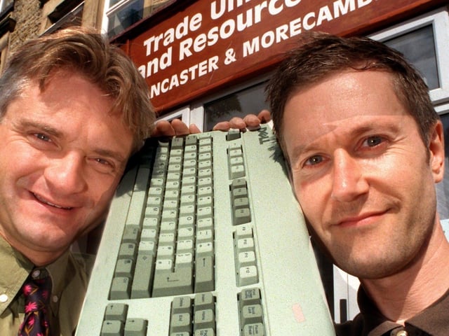 Heysham Power Station Press Officer, Martyn Butlin (left), presents Lancaster and Morecambe Trades Union Resource Centre representative, David Barnes, with office equipment in 1999.