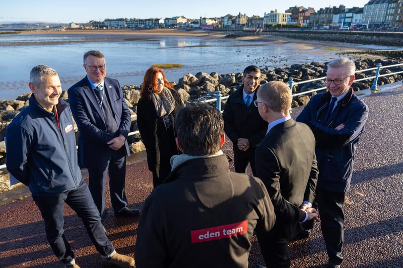 The PM stops for a chat on Morecambe promenade.