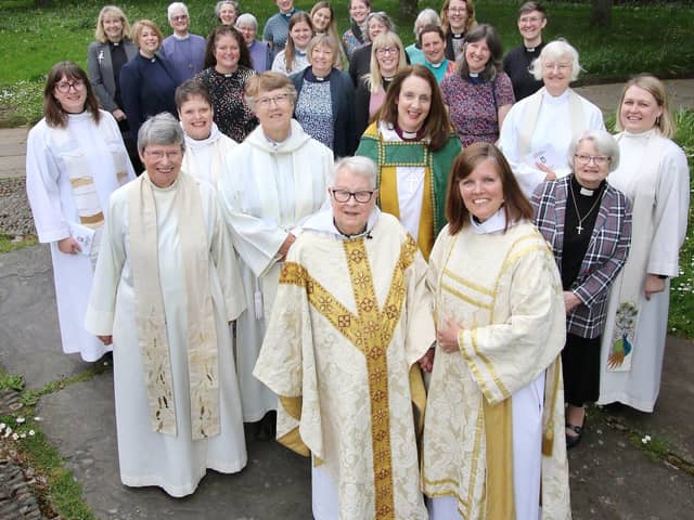 Bishop Jill, centre with green, surrounded by women clergy who attended the service