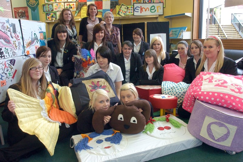 Heysham High School Year 11 GCSE textiles students delivered a selection of their work to Morecambe Library as part of the school's annual library link project. At the back are district librarian Diane Baxter (right), library assistant Gemma Drumm (left) and textiles teacher and head of design technology Stephanie Williams.