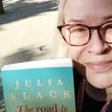 Julia Slack with her new book, The Road to Somorrostro.