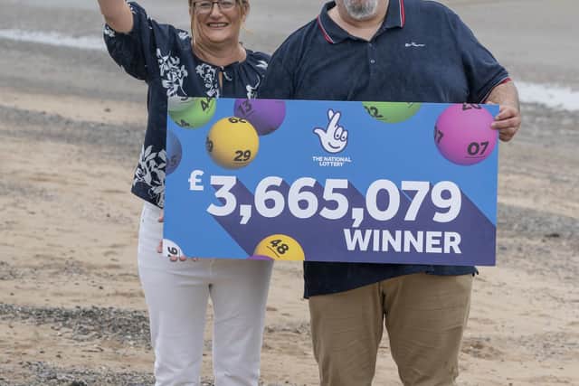 Helen and Lee Kuchczynski, from Cumbria, during a photo call to celebrate their £3.6 million EuroMillions win, in Morecambe, Lancashire. Picture date: Friday July 22, 2022. PA Photo. See PA story LOTTERY EuroMillions. Photo credit should read: Danny Lawson/PA Wire