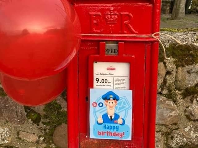 A special message for Phil on a village postbox.