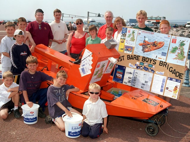 A group from 1st Bare Boys Brigade who raised money for the RNLI when they pushed a model lifeboat which they made themselves along Morecambe promenade.