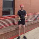 Jordan pictured at Anfield for the abseil.