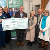 John Morphet, CEO of Pure Leisure Group, presents a cheque for £50,000 to St John's Hospice in Lancaster. Photo: Kelvin Lister-Stuttard