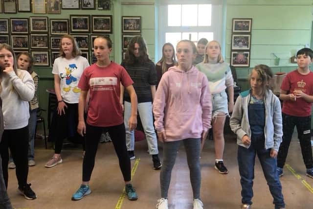 Some of the kids from The Courthouse Kids Theatre in Settle in rehearsal this week for their performance of Bugsy Malone.