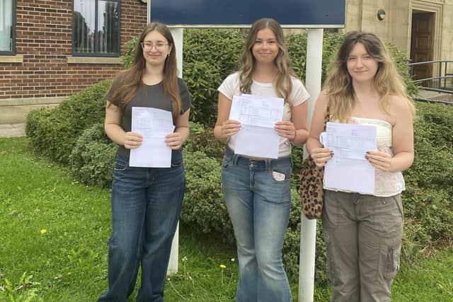 Morecambe Bay Academy pupils celebrate their A-level results.