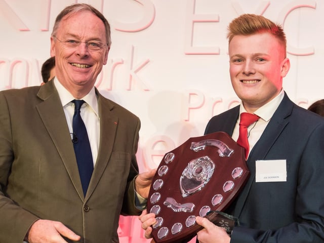 Heysham 1 Power Station’s Joe Dickinson receives his EDF Energy Apprentice of the Year award from EDF Energy’s CEO Vincent de Rivaz.