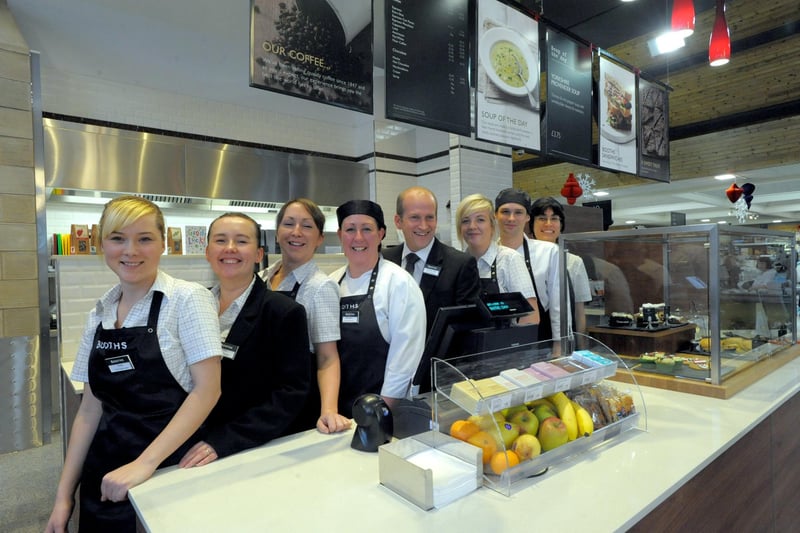 Manager of Booths, Carnforth, Steve Allan, with staff in the new cafe.