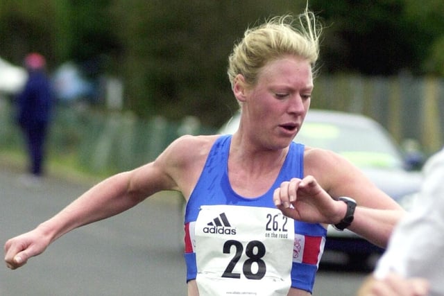 First woman home Alison Crook checks her time in the Green Drive Five race which took place in Lytham,