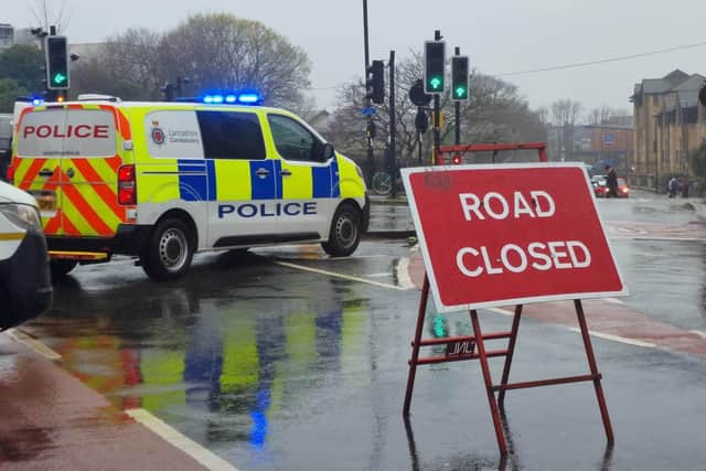 Police closed the road near the Royal Lancaster Infirmary after a crash caused a major fuel leak. Picture by Joshua Brandwood.