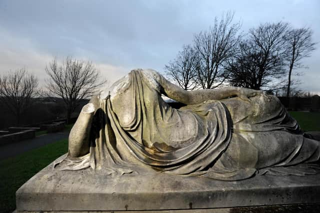 The headless and footless statue lying on the tomb outside Priory Church, Lancaster. You can learn all about this lady on a new tour in Lancaster. Photo Neil Cross.