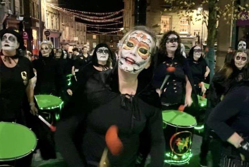 Samba Espirito during a Halloween parade through Lancaster.