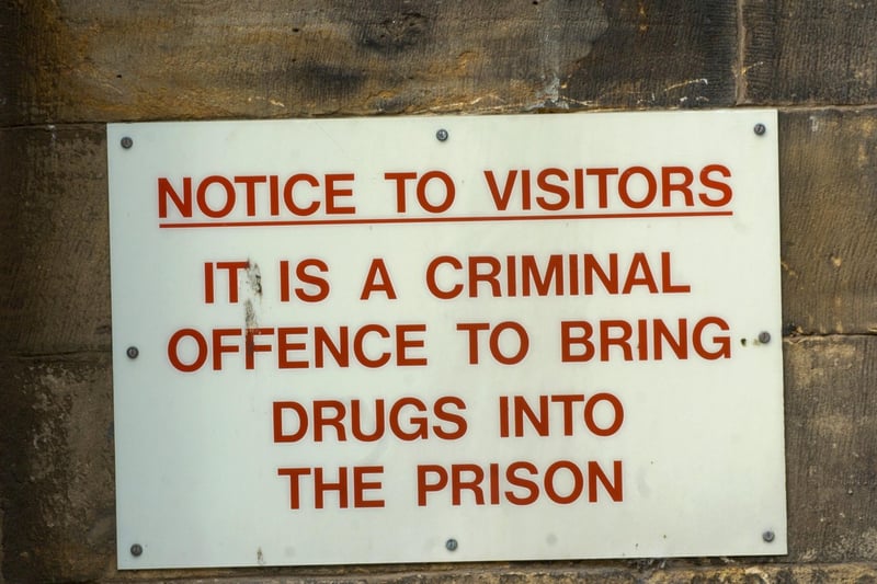 A sign warning visitors not to bring drugs into the prison.