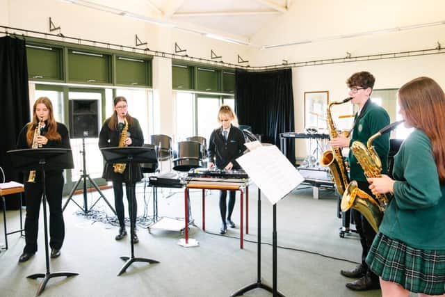 Kaitzy practises with a saxophone quartet at Queen Elizabeth School as part of her BTec studies. Picture: Ginny Koppenhol