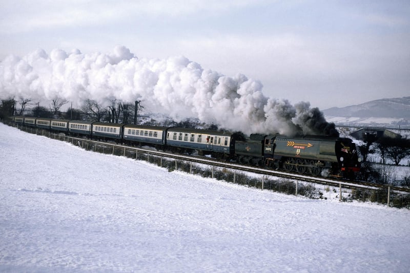 The Golden Arrow No 34092 City Of Wells leaves Carnforth at Burwick en route for Skipton on December 12, 1981.