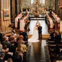 Michelle and Aaron's wedding ceremony at Lancaster Priory on Coronation Day. Photo by James Hicks Photography