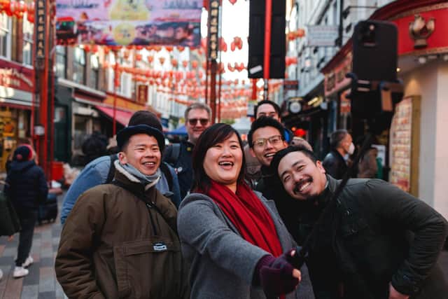 Anna Chan, 34, with community members at an event in London Chinatown. Photo: Charlotte Hu.