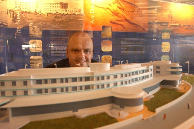One time general manager of the Midland Grand Hotel, Tudor Williams, with a model of what the hotel could look like after renovation.