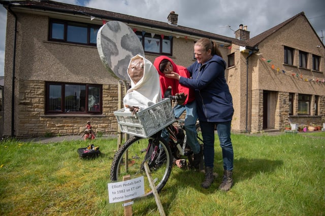 This was a moving scarecrow of ET and Elliott on his bike pedalling at the Wray Scarecrow Festival 2024 with a sci-fi theme.