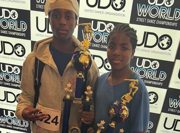 Michael Omoruyi, 14, and Dylan Dennis, 15 with their trophies from the UDO World Street Dance Championships at Blackpool Winter Gardens