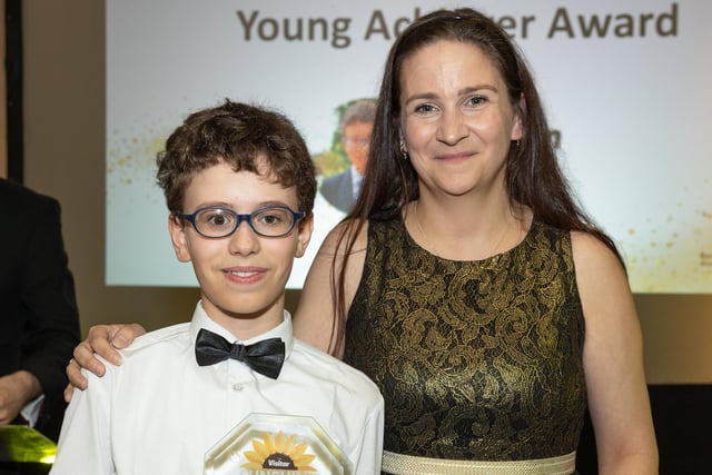Young Achiever of the Year Kyden Waite receives his award from Lydia Read-Potter, managing director of Booksmart Accounting.