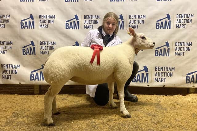 Ellie Jackson with her prizewinning lamb.