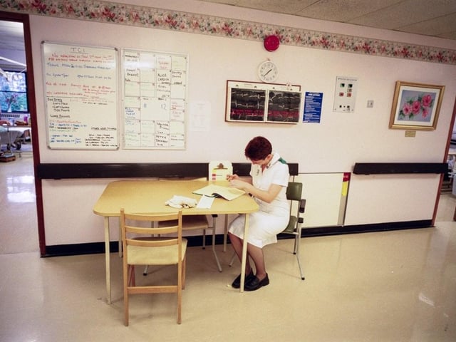 A nurse making notes in the entrance to ward 23 at the RLI 26 years ago. Photo by DJ Clark.
