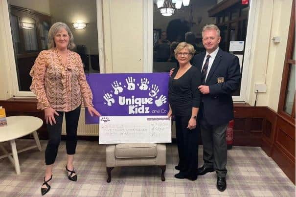 From left: Jane Halpin, co-founder & trustee of Unique Kidz and Co, 2021 Lady Captain Sharon Carney and 2021 Captain David Carney.