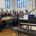 Piano teacher Yvette Price holds a Christmas concert every year where her students perform for family and friends and also raise money for St John's Hospice.