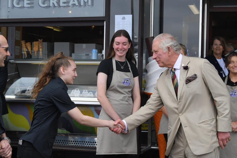Prince Charles meets staff from Brucciani's during his visit to Morecambe in 2022.