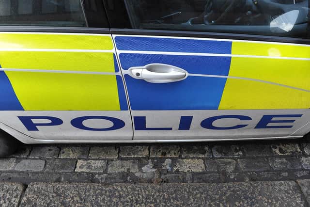 Police arrested six men at a house in Morecambe after a stolen car was abandoned nearby.
