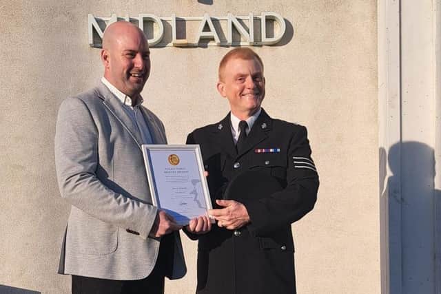 Steven Dennett being presented with his bravery award by Sergeant David Forshaw at The Midland hotel in Morecambe.