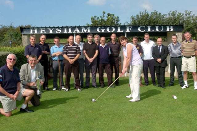 Golfers at the first tee at the Lancaster District Chamber of Commerce Golf Challenge 2010, held at Heysham Golf Club. Holding the trophy are Barry Scoffin, who introduced the competition when he was chief executive in 1994 and past president, Norman Haworth
