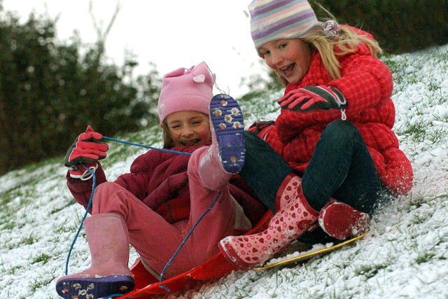Sisters Emily, nine, and Naomi Hall, seven, from Fleetwood enjoying the snow on The Mount