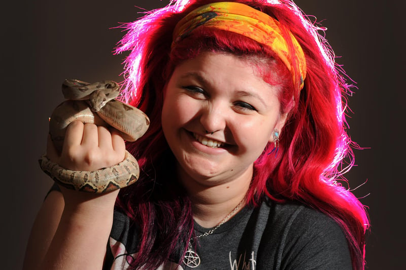 Nixie Sharples with a boa constrictor during an Animal Welfare session at Lancaster and Morecambe College.