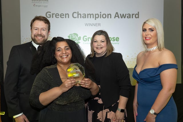 Green Champion Award winners Green Rose Cic receive their award from Nena-Leigh George of EDF Energy.