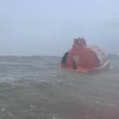 The ship's lifeboat was drifting into the Heysham channel with possible people on board.