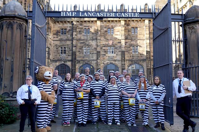 'Prisoners' taking part in the St John’s Hospice ‘Jail and Bail’ event.