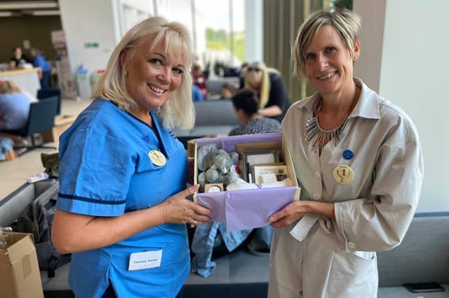Claire Mason (right) showing one of the HOPE boxes, with Catherine Randall, the NHS England National Associate Director of Safeguarding.