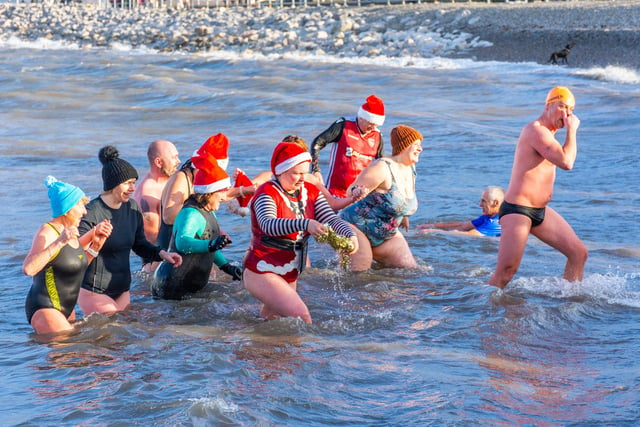 Getting out of the sea after a cold Boxing Day Dip. Picture by Keith Douglas.
