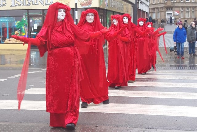 Extinction Rebellion protestors dressed in red were in Morecambe this weekend to highlight the shocking state of our rivers and sea.