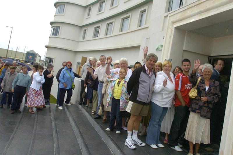 The first members of the public queue for a look inside the hotel at the grand opening in 2008.